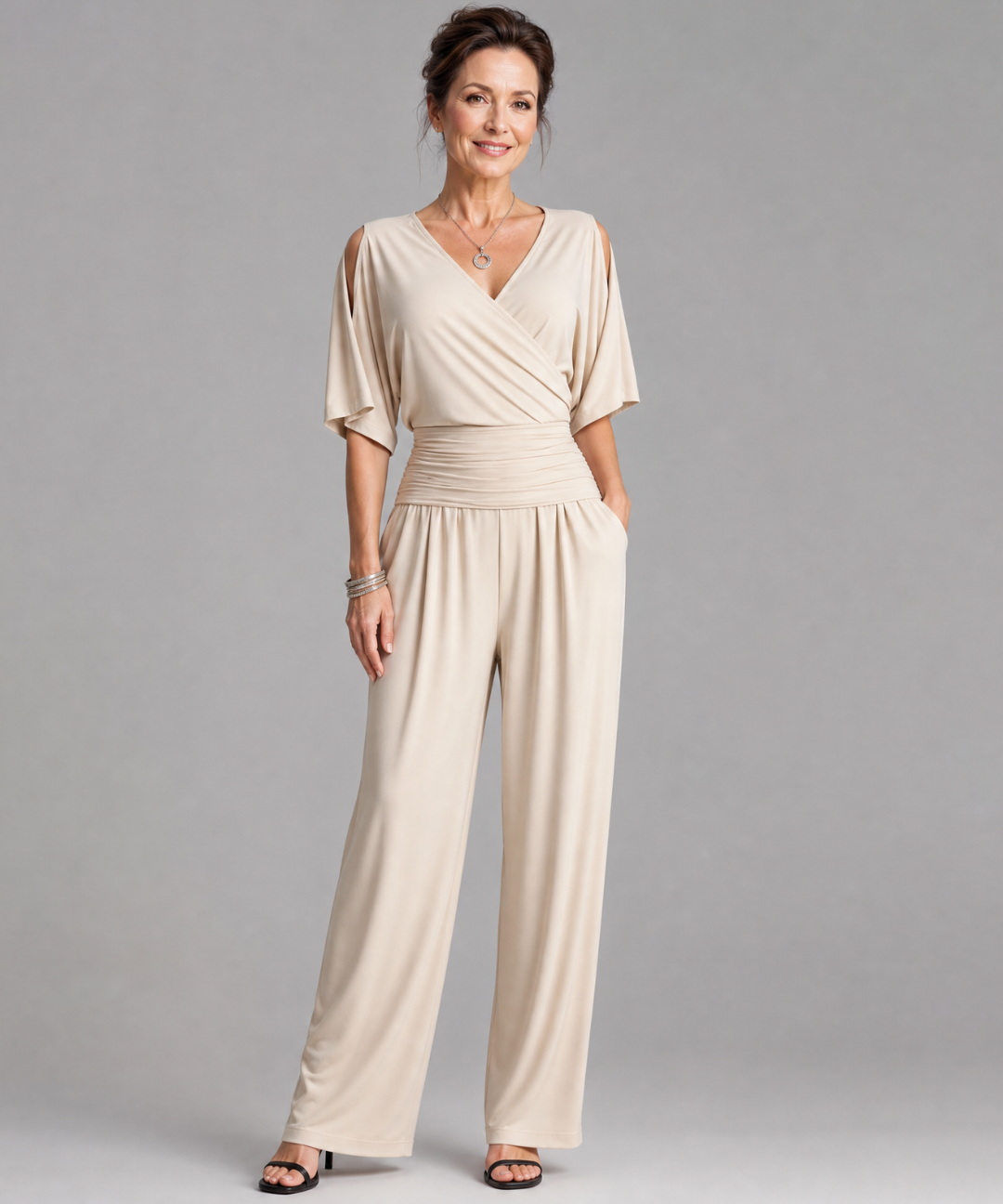 Tilda – Avslappnad overall med cold shoulder och omlottmidja