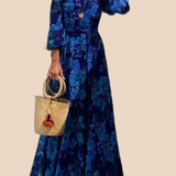 Ulla – Lång blomtrycksklänning med off-shoulder-ärmar