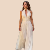 Maja – Plisserad overall med halterneck och vida ben